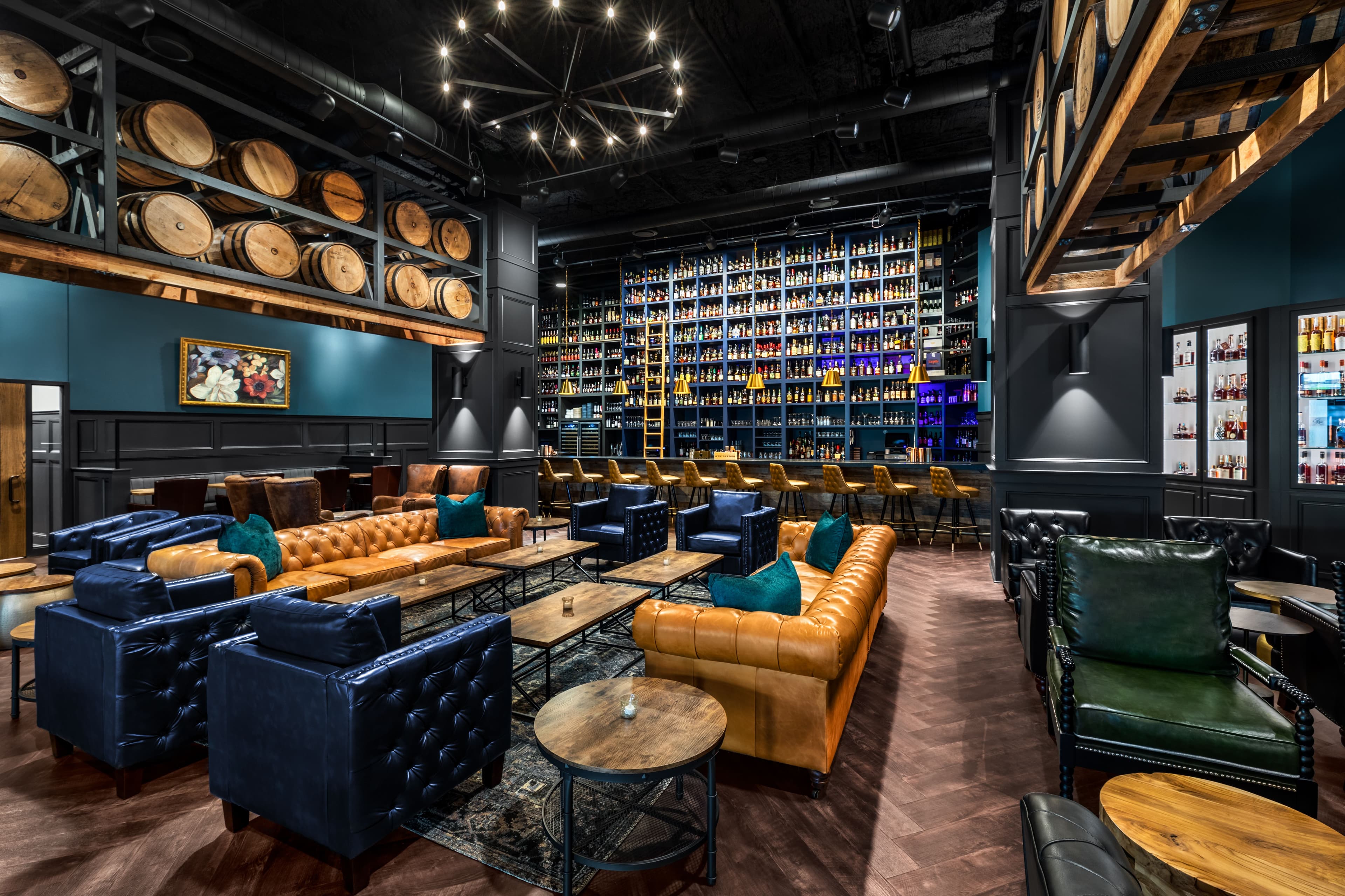 An inside look at the bar featuring a wall of Bourbon.