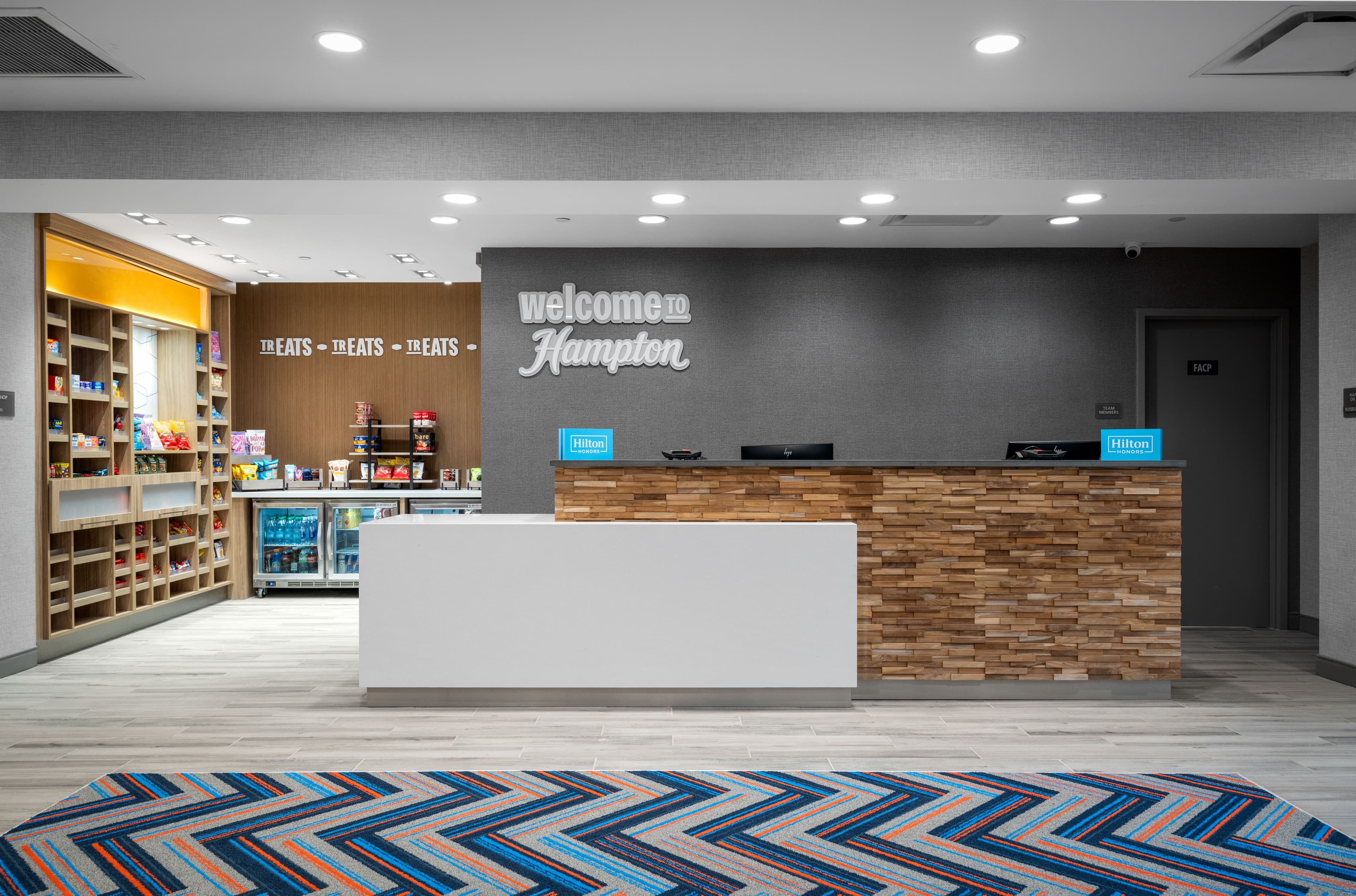 Front desk in the Hampton Inn and Suites in Louisville, KY.